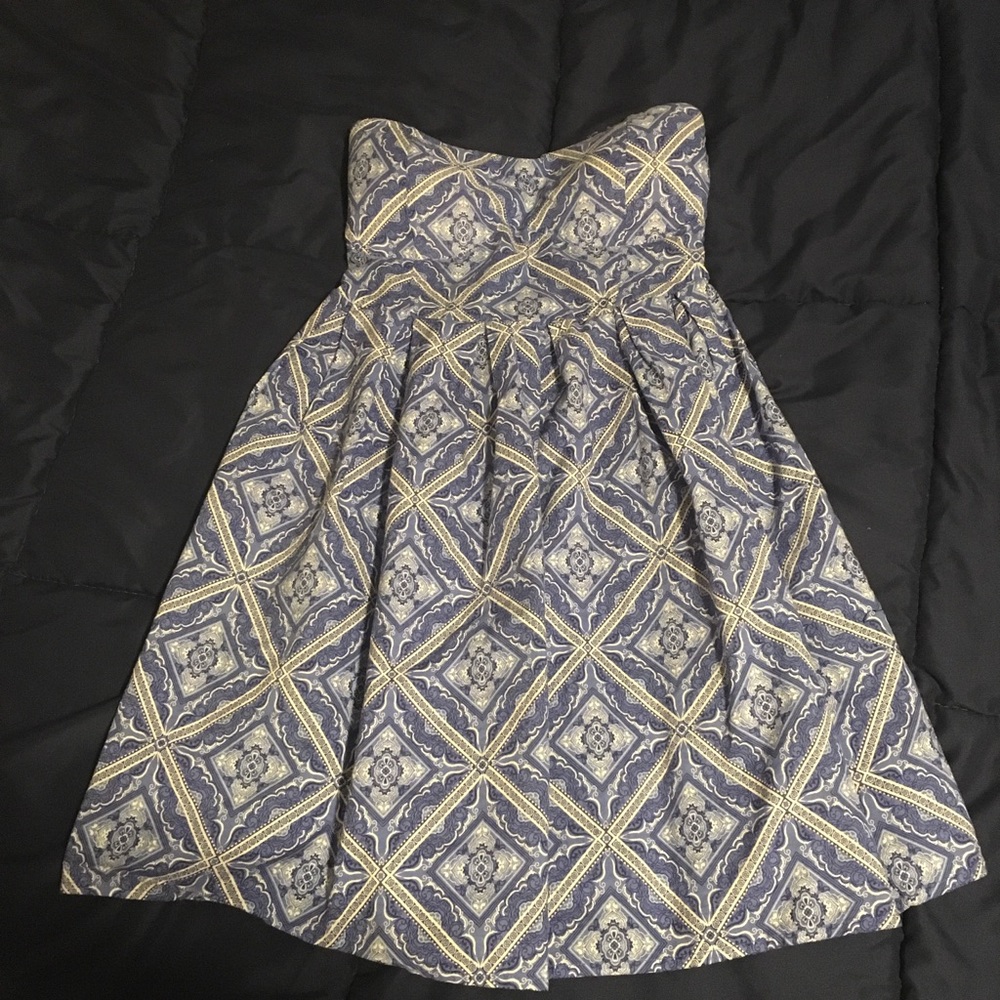 I’m in love with Derek strapless mini dress.